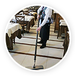 man mopping the restaurant floor